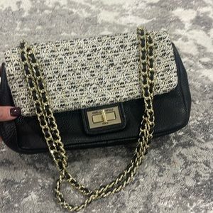 Karl Lagerfeld Black leather with grey and gold sparkles.